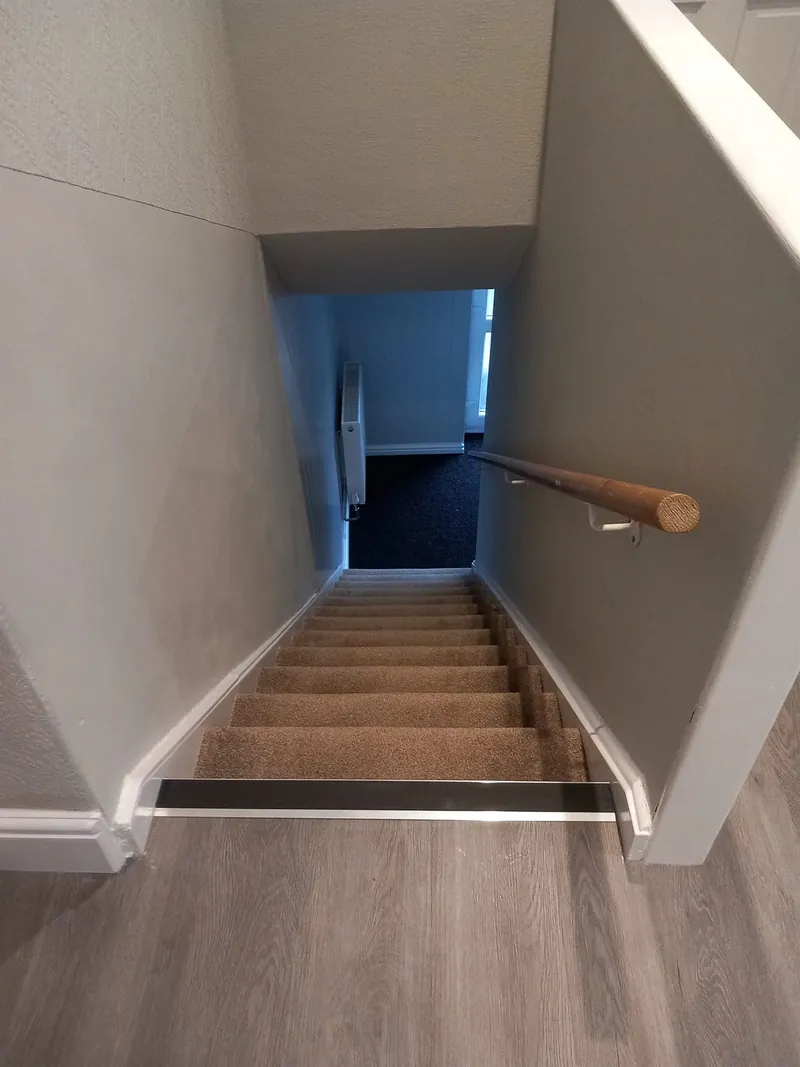 Stairs to the lower ground floor